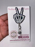 Skeleton Hand Peace Badge Reel